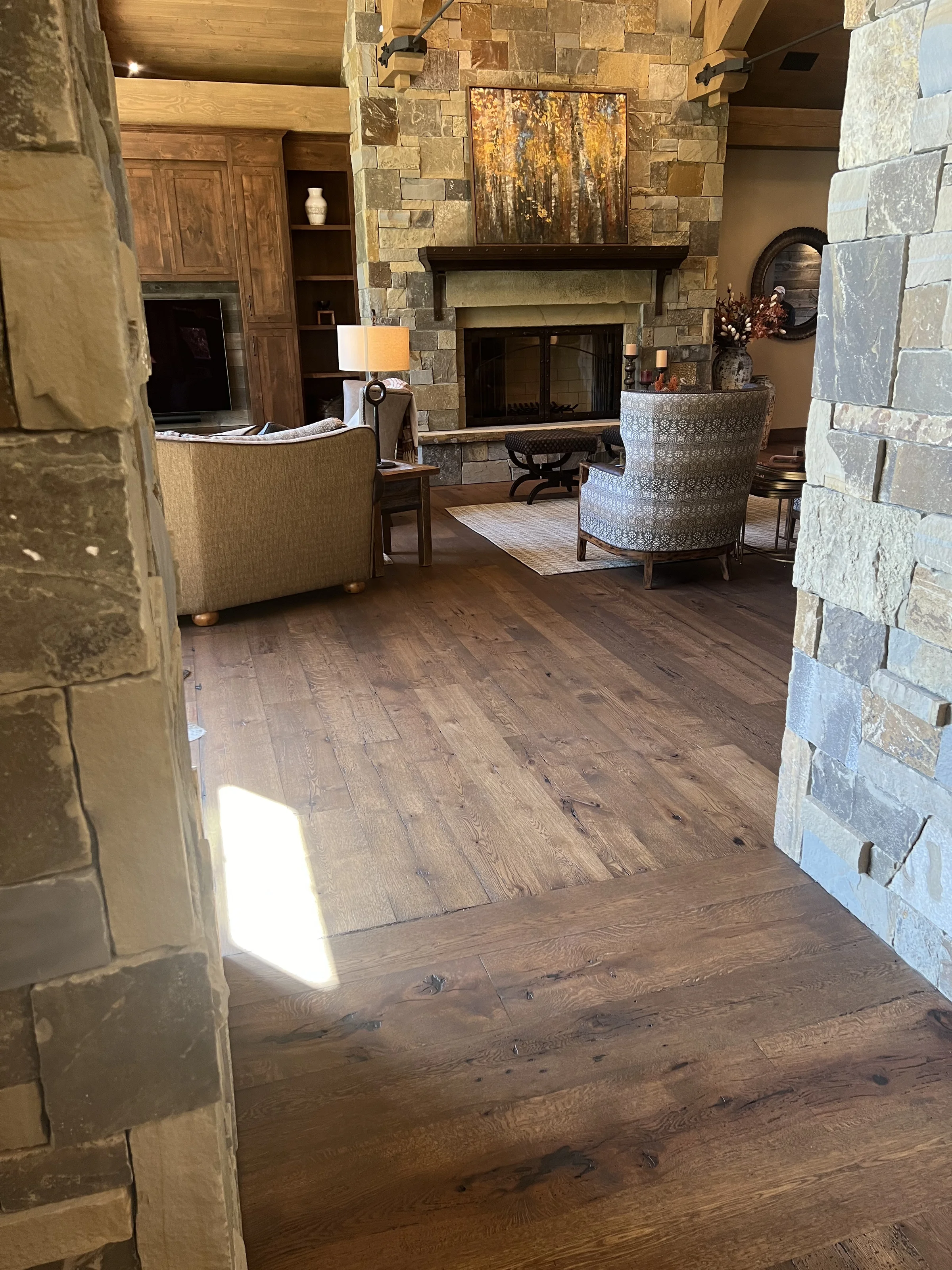 Beautiful living room with hardwood floor in a Winnwood Flooring featured project