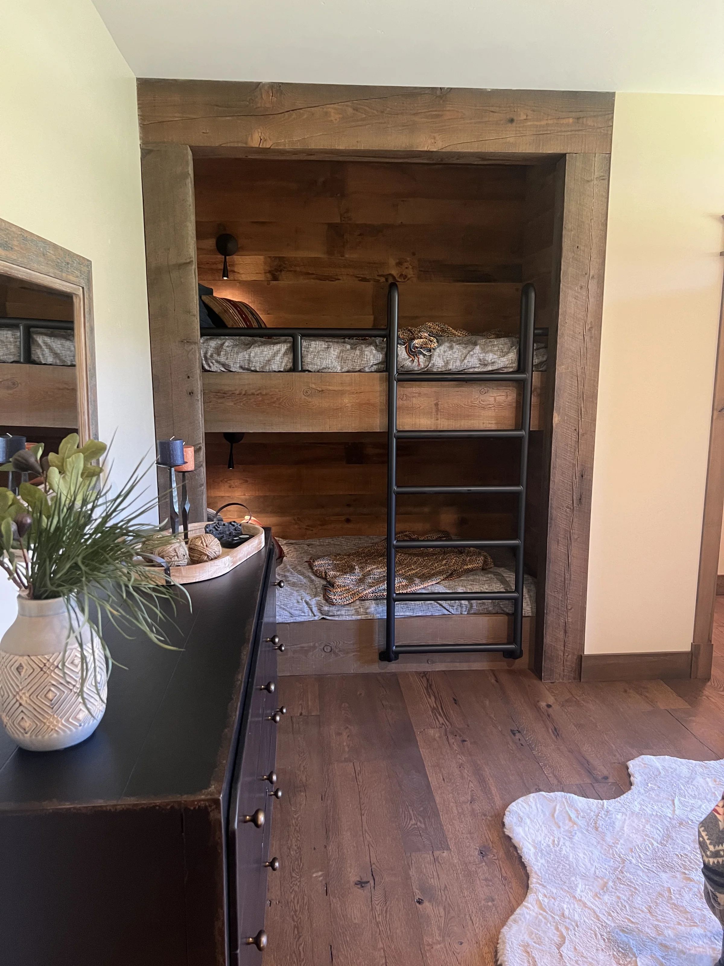 High-end bunk beds built into a hardwood-floored kids room in a Winnwood Flooring featured project
